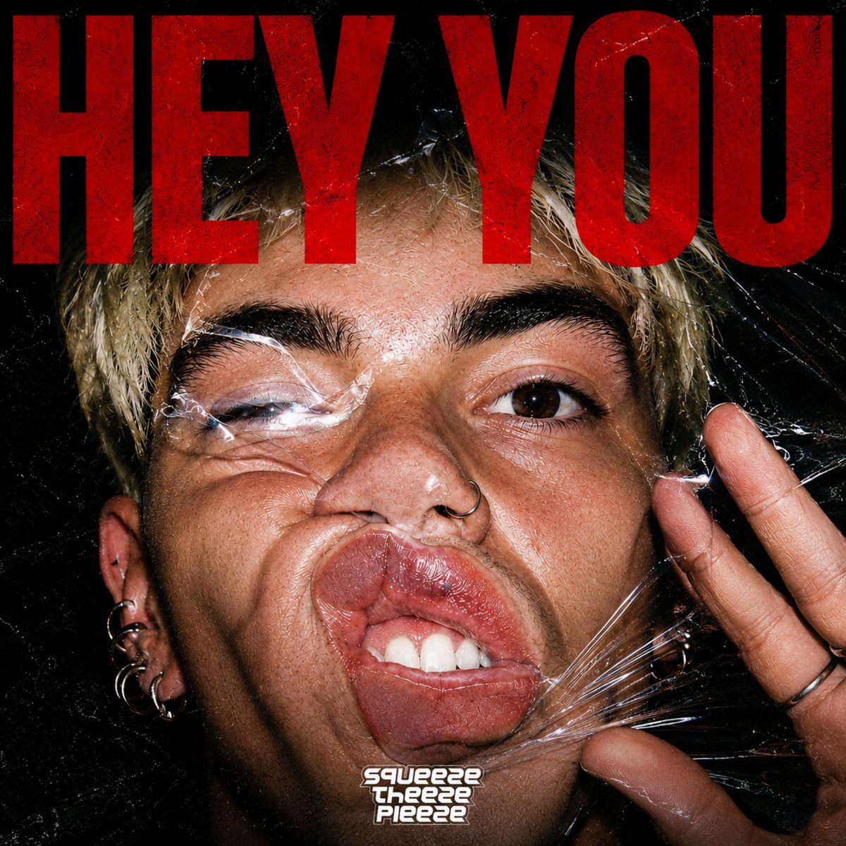 HEY YOU artwork: red lettering above a face behind transparent film